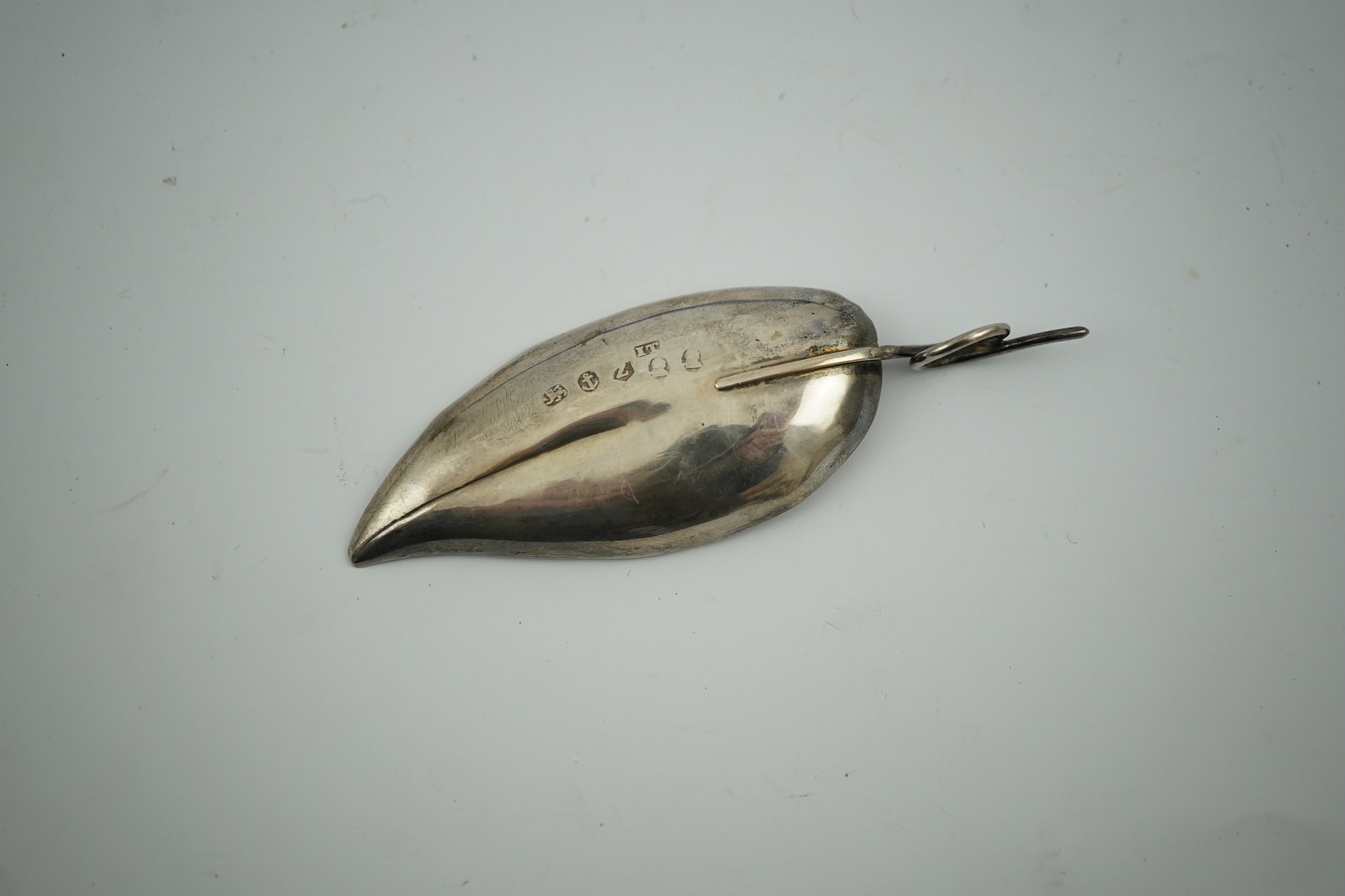 A George IV silver leaf shaped caddy spoon, maker I.T. Birmingham, 1823, 81mm. Condition - fair